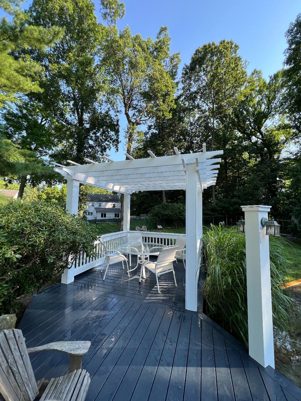Custom white pergola over a new deck built in Larchmont, NY