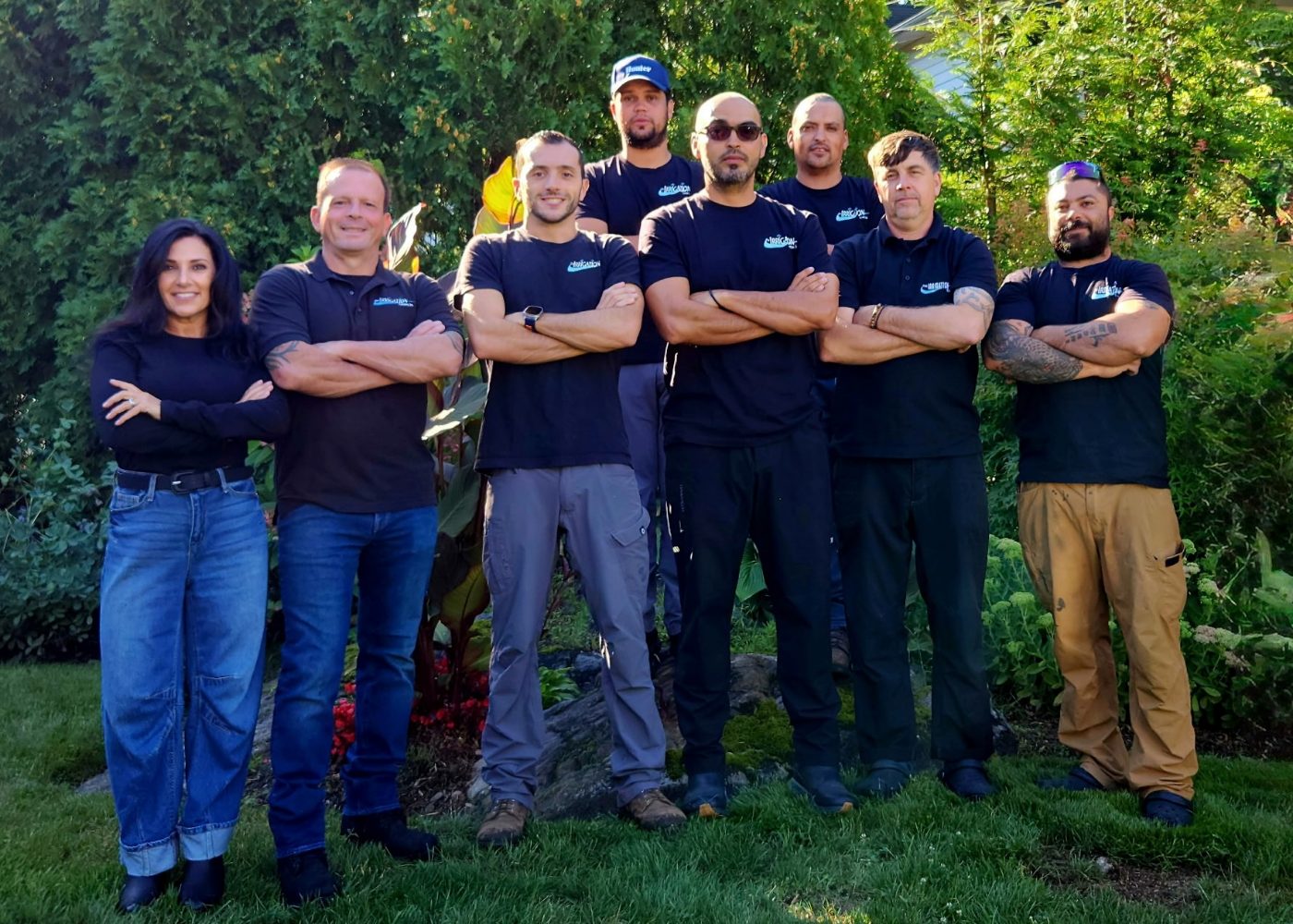 The Irrigation Co. team in company shirts, a family owned lawn sprinkler and landscape lighting company in Westchester County, NY